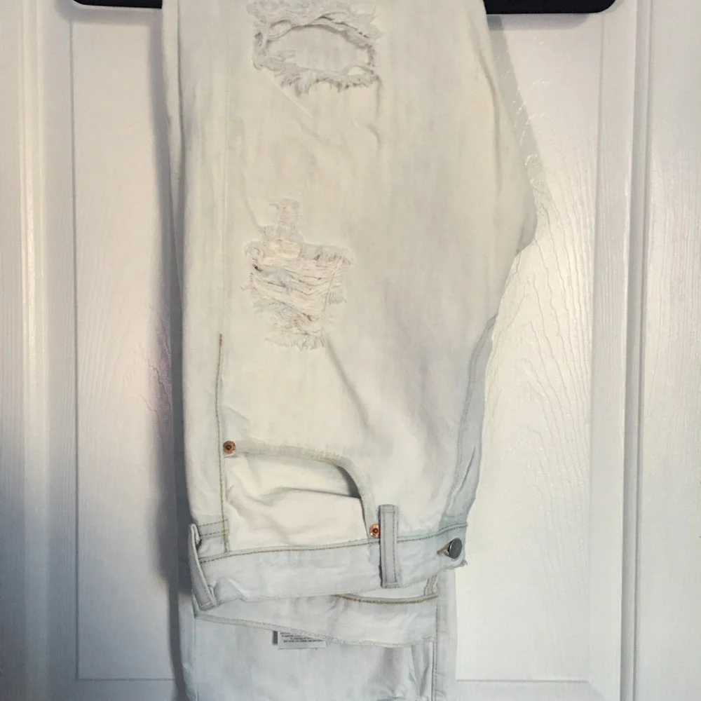 Levi’s 501 light(white) washed ripped jeans